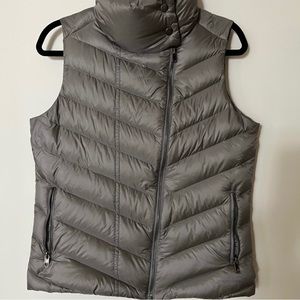 Patagonia down vest, gray, size M. Asymmetrical zipper closure.